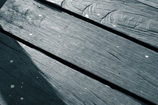 closeup black and white ironwood planks photo