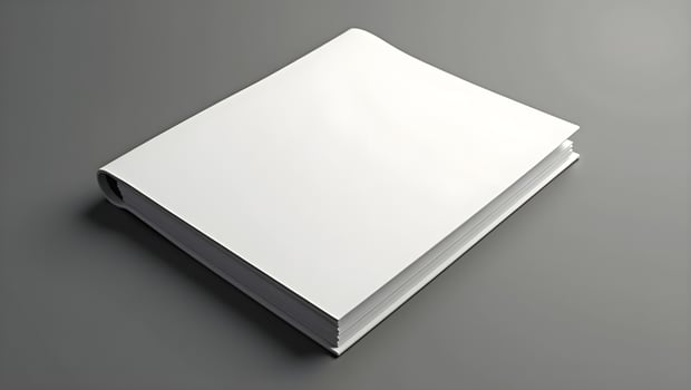 High-Angle Blank Brochure Mockup with Slightly Curled Edges photo