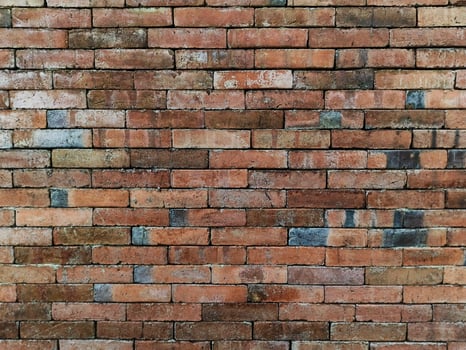 close up natural Brick of the wall and cement, The bricks are arranged neatly and glued with cement to form a wall photo