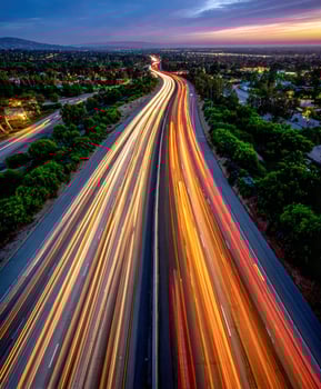 Light trails on the highway during sunset in Southern California photo