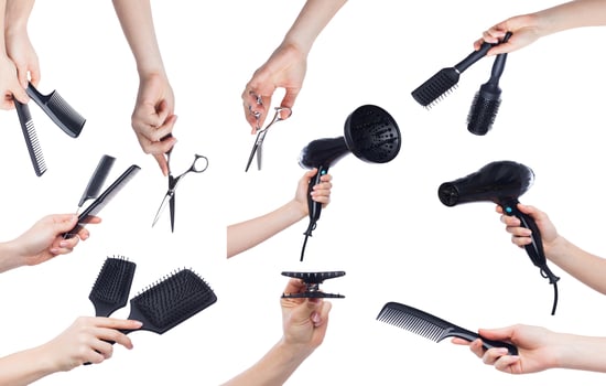 Set of human hands holding hairdressing tools isolated on white background photo
