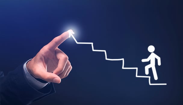 Goal Setting And Achievement. Businessman's Hand Drawing Staircase Steps For Stickman Over Blue Background. Collage photo