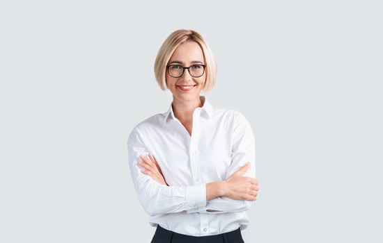 Businesswoman smiling with arms crossed photo