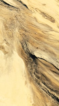 Abstract Texture of Sand and Water Ripples and Currents in a Sandy Streambed. photo