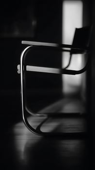 Modern Chair Silhouette A Study in Light and Shadow. photo