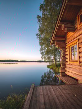 Lakeside Log Cabin at Sunset Tranquil Summer Evening by the Water. photo