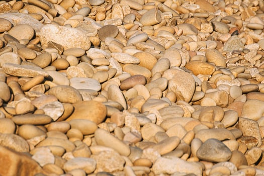 natural material texture an abundance of diverse sized smooth pebbles photo