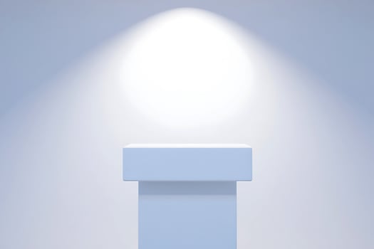 A podium with a spotlight on top of it photo