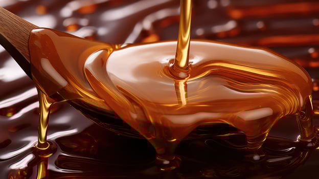Chocolate syrup pouring, rich and decadent. photo