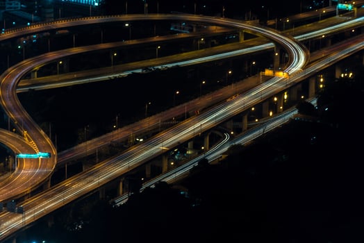 An aerial view of a highway at night photo