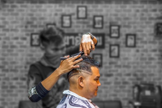 A man getting his hair cut photo