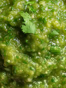 Close Up of Fresh Homemade Green Salsa with Cilantro. photo