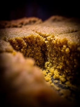 Close up of a Broken Piece of Crumbly Homemade Cake. photo