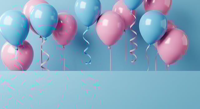 Pink and blue balloons on a blue background photo