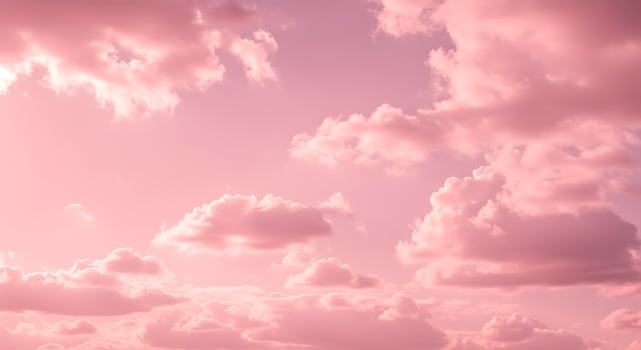 A pink sky with clouds and pink clouds photo