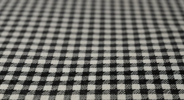A black and white checkered fabric photo