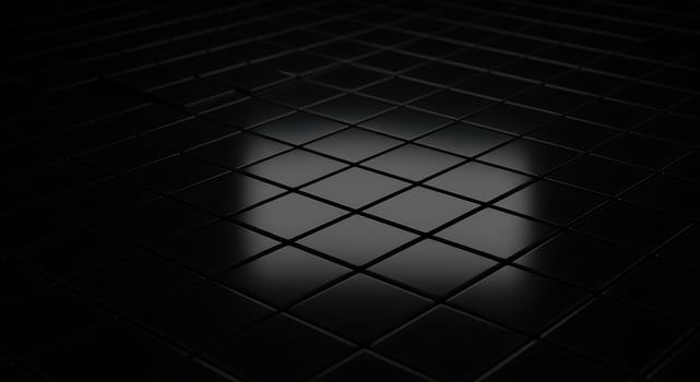 A black and white image of a square tile floor photo