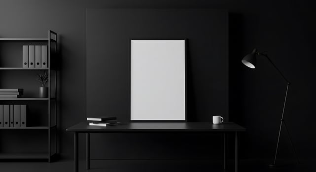 Black office with a desk and a blank white poster photo
