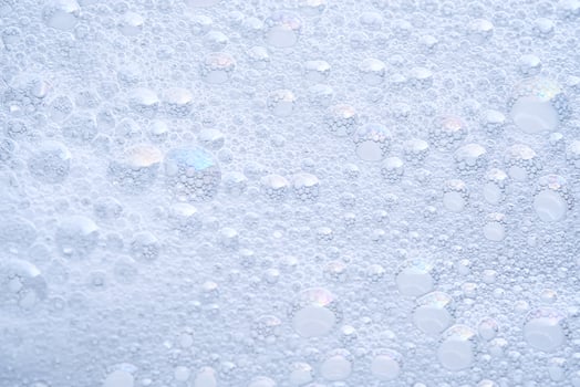 The texture of dense foam with bubbles. photo