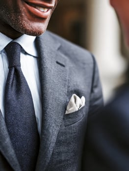 A close up of a man in a suit and tie photo