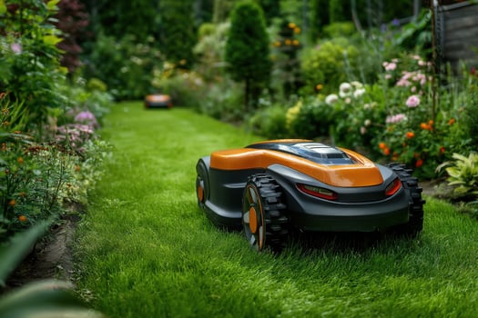 A robotic lawn mower in a garden photo