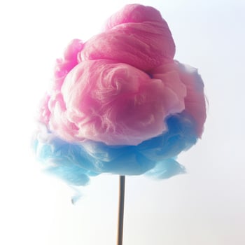 A cotton candy on a stick with a blue and pink cloud photo