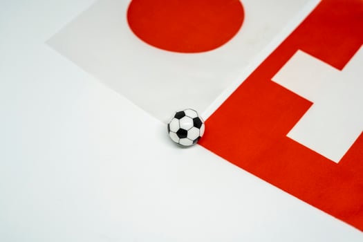 Japan vs Switzerland Football Rivalry Featuring National Flags photo