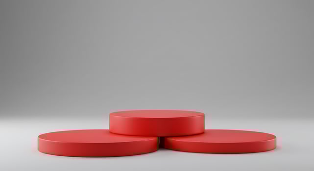 Three red pedestals on a gray background photo