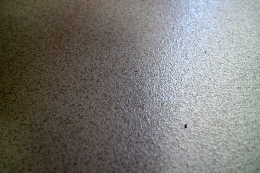 Textured Beige Surface with Subtle Sheen photo