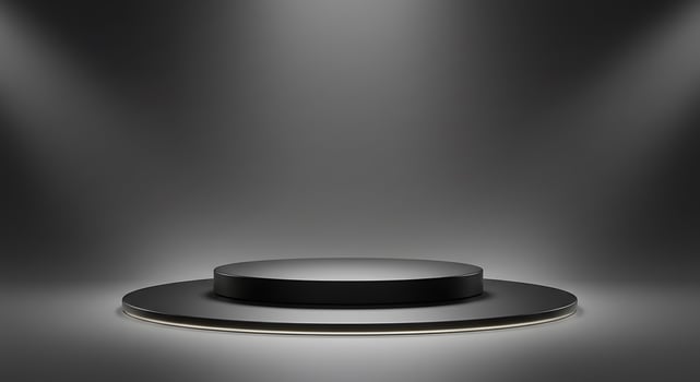 Black podium with spotlight on a dark background photo