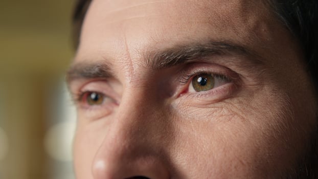 Thoughtful man Caucasian businessman close up pensive male portrait serious thinking consider business employer worker indoors think middle-aged guy green eyes close up looking health vision eyesight photo