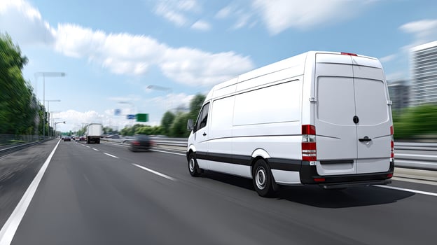 A white van driving on the highway photo