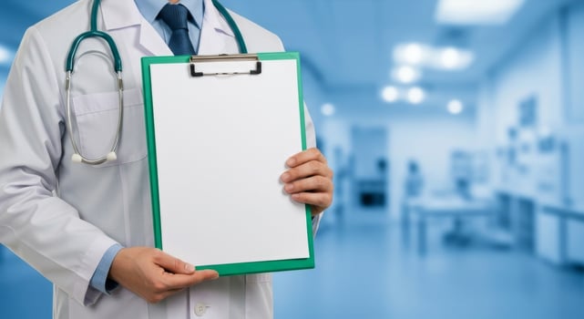 Doctor Holding Blank Clipboard in Medical Setting, Ready for Patient Information or Medical Data photo