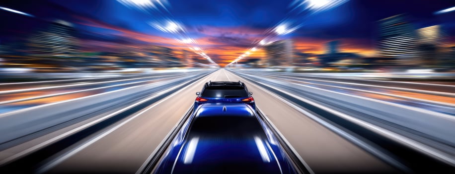 A car driving on a highway at night photo