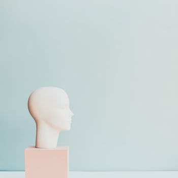 Pastel minimalist mannequin head display photo