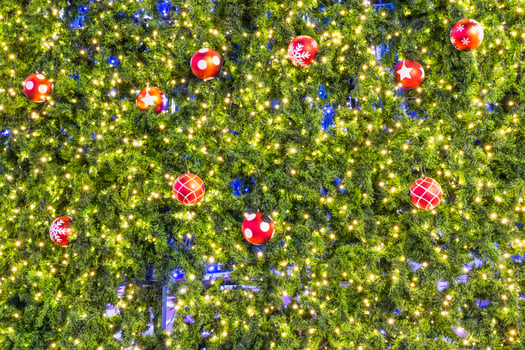 A large christmas tree with many ornaments on it photo