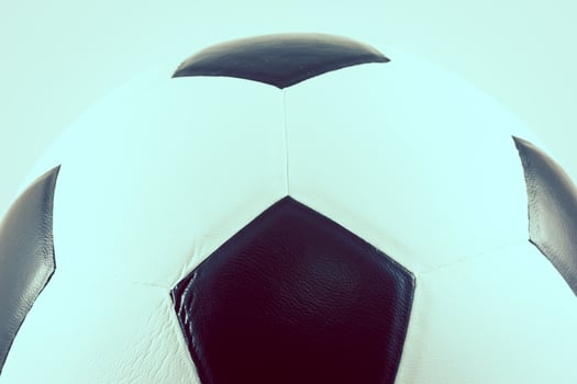 A close up of a soccer ball on a white background photo