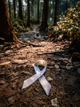 PTSD Ribbon Gracefully Intertwines With a Tranquil Forest Pathway at Dawn, Symbolizing Hope and Healing Along the Journey photo
