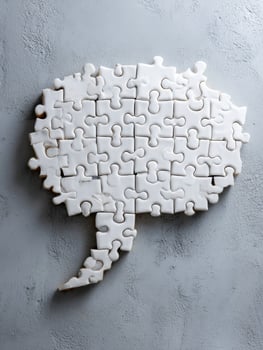 Creative Teamwork Concept Featuring Puzzle Pieces Arranged in a Speech Bubble Shape Against a Minimalistic Background for Collaboration Ideas photo