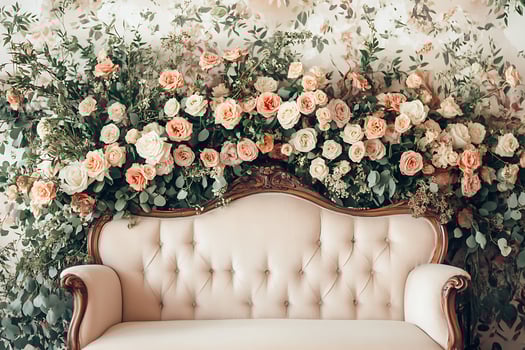 Elegant Antique Sofa Adorned with a Lush Floral Arrangement. A beautiful image perfect for wedding, home decor, or floral design inspiration. photo