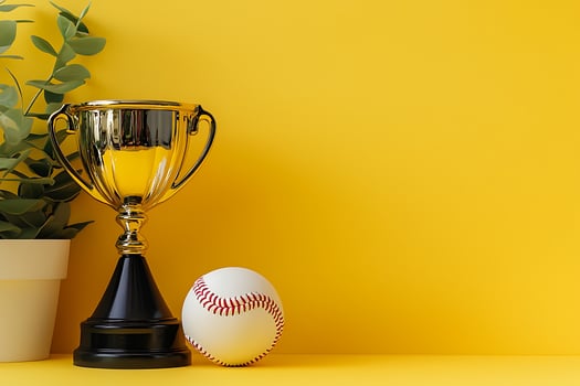 Gold Trophy and Baseball on Yellow Background Winning Championship Concept. photo