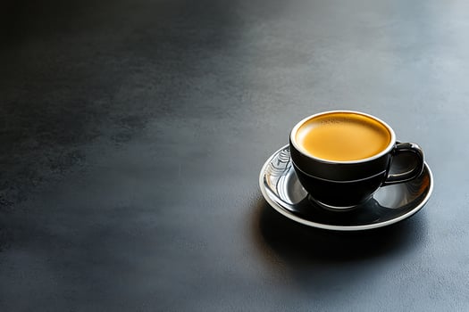 Espresso Coffee in Black Cup on Dark Background A Close-Up Image. photo