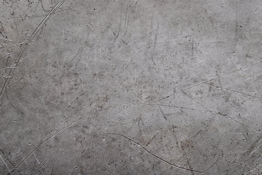 weathered metal background, damaged stainless steel texture photo