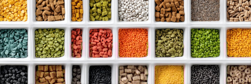 Pet Food Shelf Layout Displaying Colorful Varieties Organized by Type With Clear Labeling for Easy Identification in a Domestic Setting photo