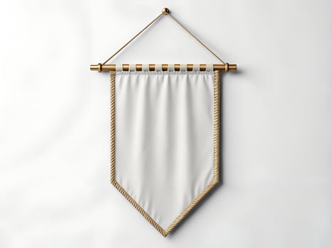Blank White Pennant with Gold Trim Hanging on White Wall photo