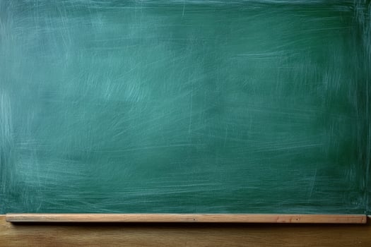 Smooth blank green chalkboard provides an ideal surface for notes, diagrams, or lessons in classrooms or study areas photo