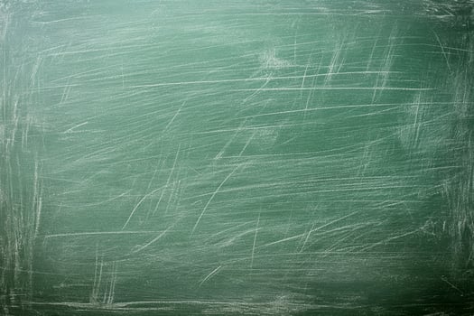 Smooth blank green chalkboard surface with subtle scratches, ideal for teaching, presentations, or artistic creations in classrooms photo