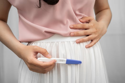 holding pregnancy test for female of ovulation day, fetus, maternity, childbirth photo
