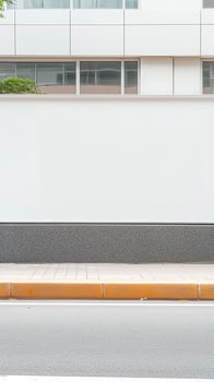 Modern Urban Street Scene with Blank White Wall and Building Facade, Ideal for Copy Space and Contemporary Design Backgrounds. photo