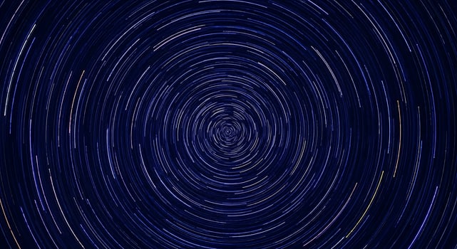 A circular pattern of stars in the sky photo